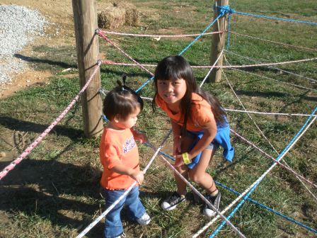 Kasen and Karis in a rope maze